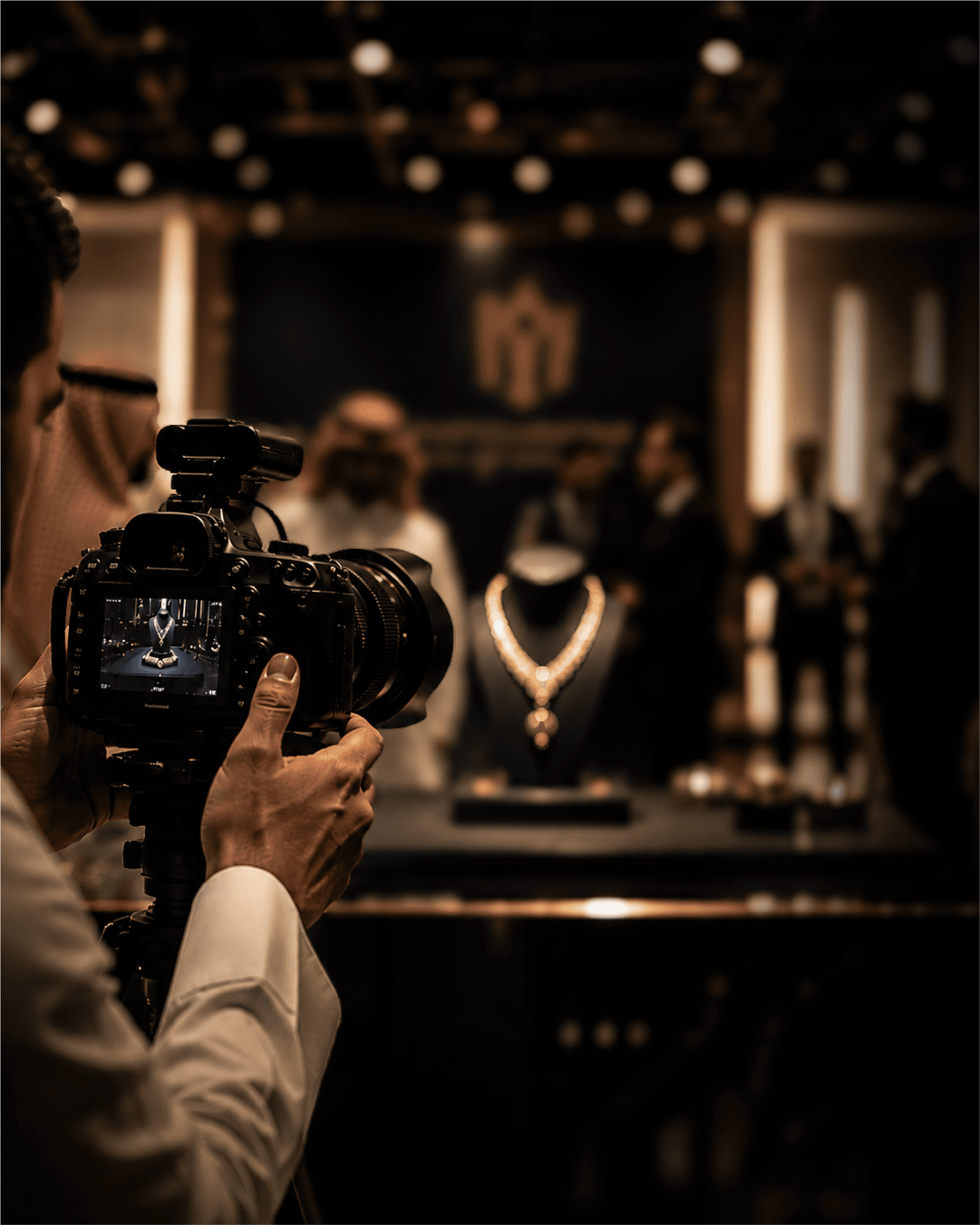 Professional cinema camera on a tripod — National Quality Company for Precious Metals